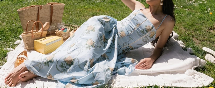 A Jia Moda dress photographed on a picnic blanket